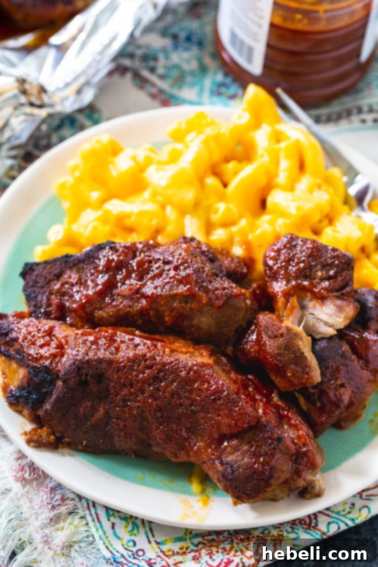 Close-up of Instant Pot Country Style Ribs slathered with BBQ sauce.