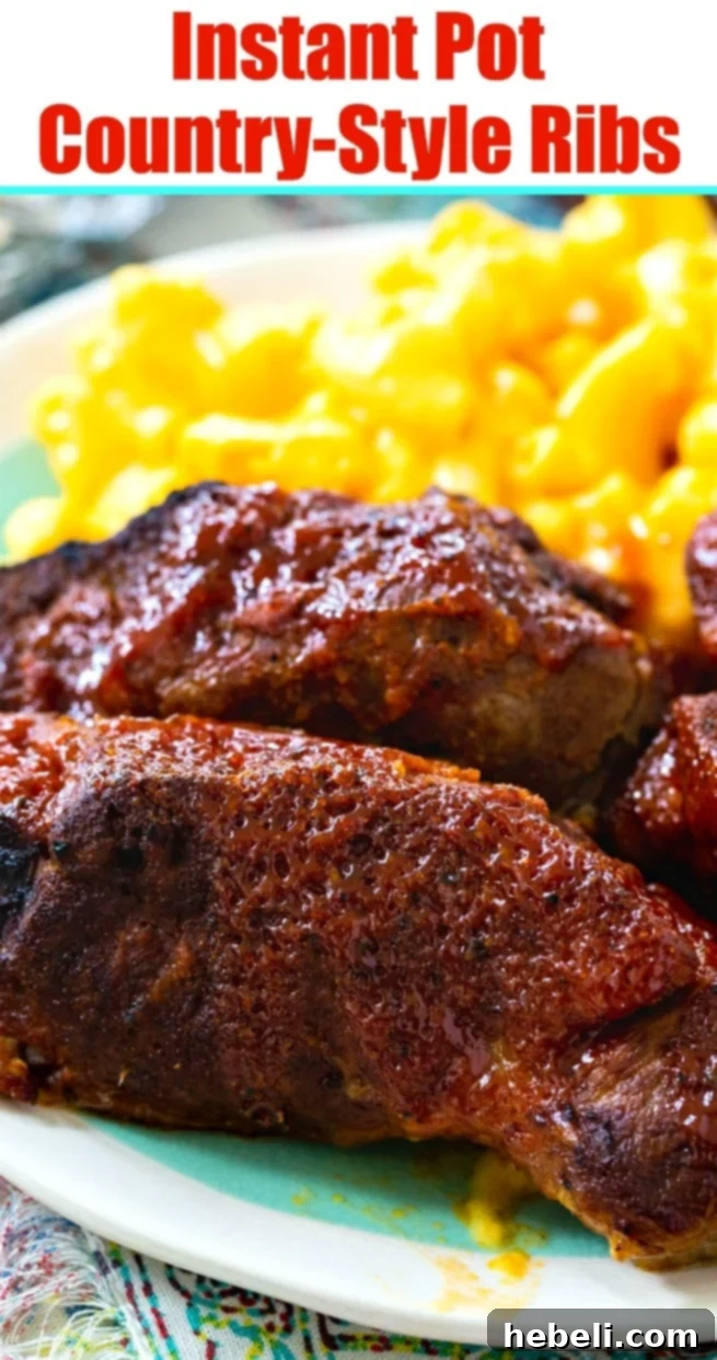 Instant Pot Country Style Ribs cooked to perfection, showing a tender, moist interior.