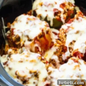 Slow Cooker Stuffed Peppers with melted cheese