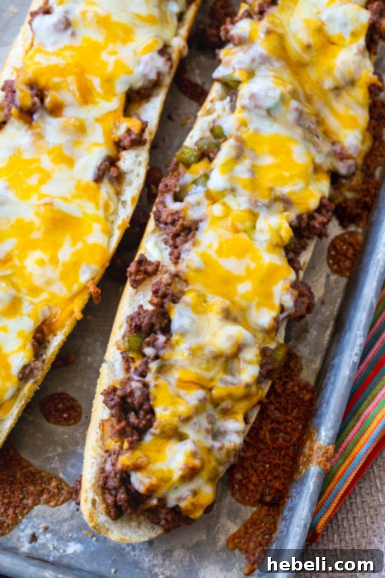 French Bread Sloppy Joe Pizza 3 Sloppy Joe French Bread Pizza prepared, ready for baking, making an easy family dinner.