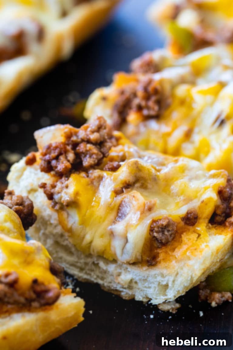 French Bread Sloppy Joe Pizza 5 Full loaf of Sloppy Joe French Bread Pizza before cutting.
