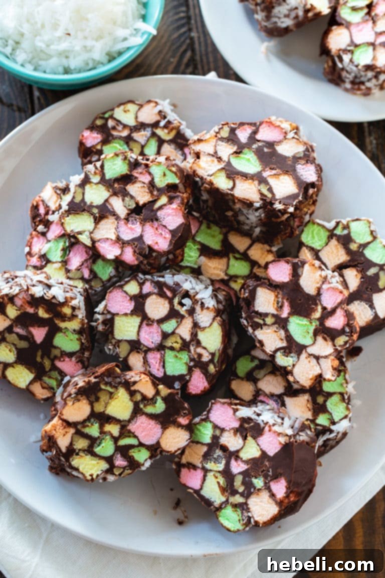 Close-up of a sliced Church Window Cookie showing the colorful marshmallow pieces.