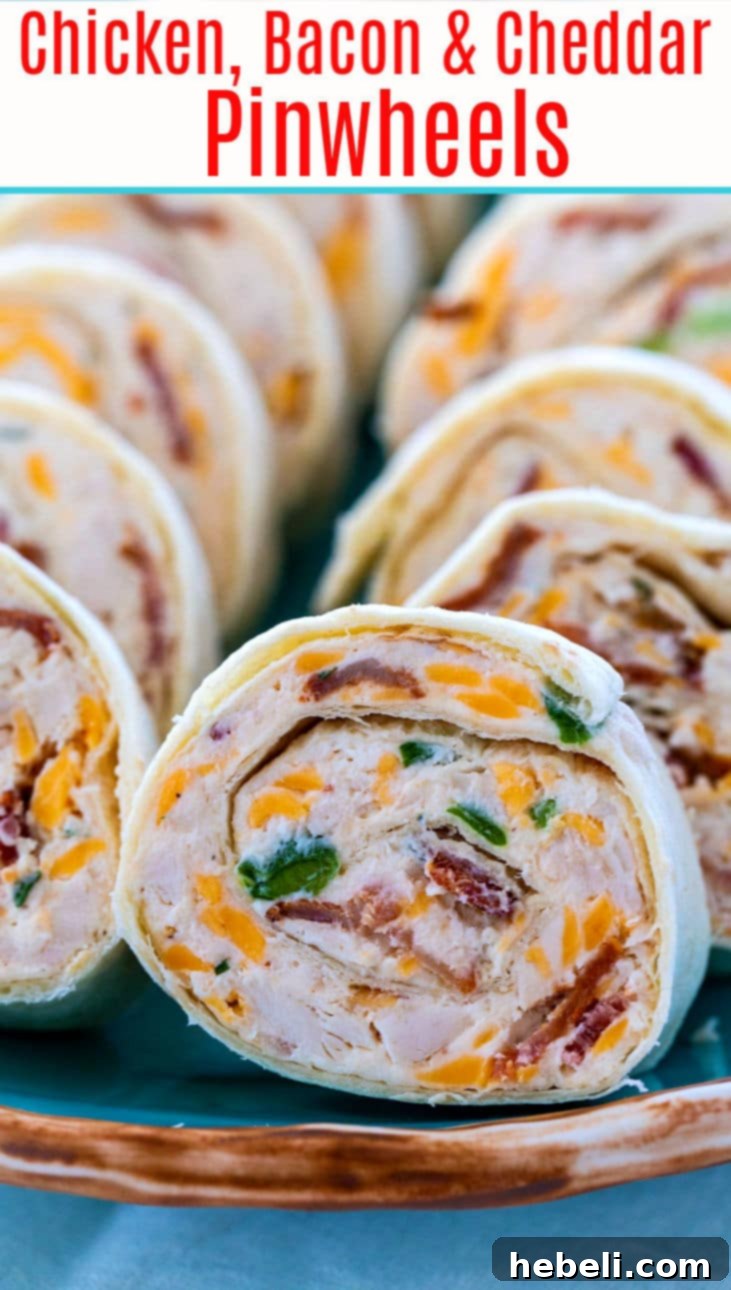 A platter of beautifully arranged Chicken, Bacon, and Ranch Pinwheels, ready for guests.