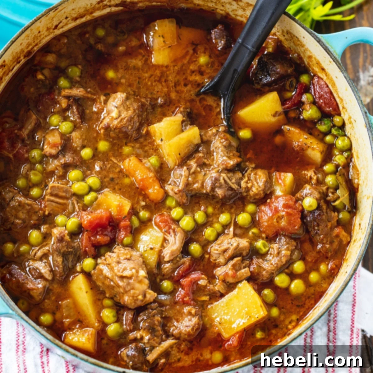 Hearty Beef Stew simmering in a classic Dutch oven, ready to serve.