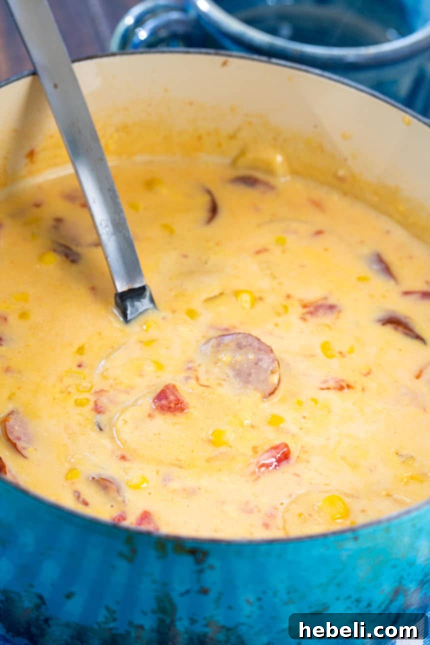 Smoky Sausage Nacho Potato Chowder 3 Close-up of Easy Nacho Potato Soup with Smoked Sausage in a bowl, showcasing its creamy texture.