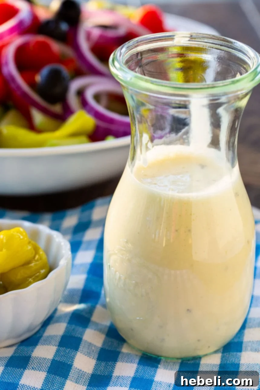 A small bowl of homemade Creamy Italian Dressing, highlighting its smooth texture and rich color.