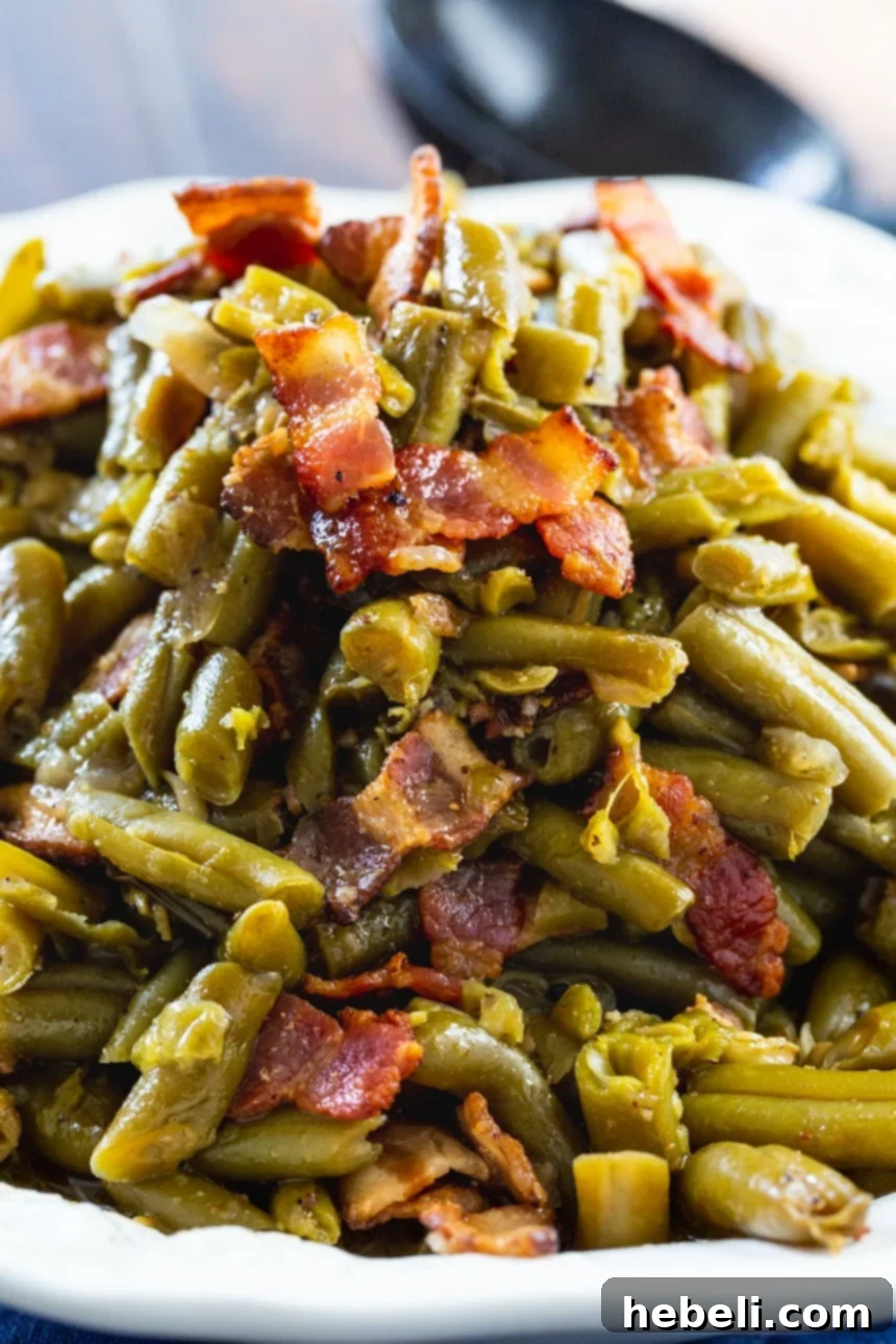 Crock Pot Garlic Buttery Bacon Green Beans 4 Crock Pot Buttery Bacon Green Beans, close-up shot of the savory dish.