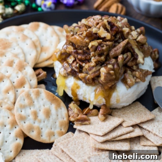French Quarter Pecan Cheese Spread, a delightful sweet and savory appetizer for parties, served with crackers
