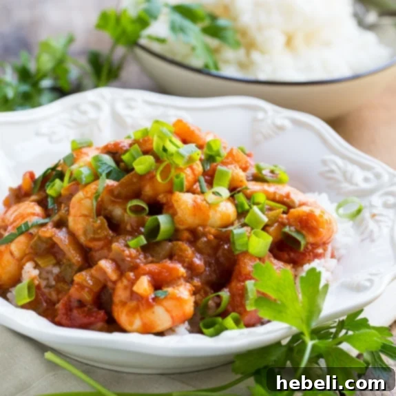 Easy Shrimp Creole - plump shrimp cooked in a savory tomato sauce flavored with onion, garlic, and green pepper
