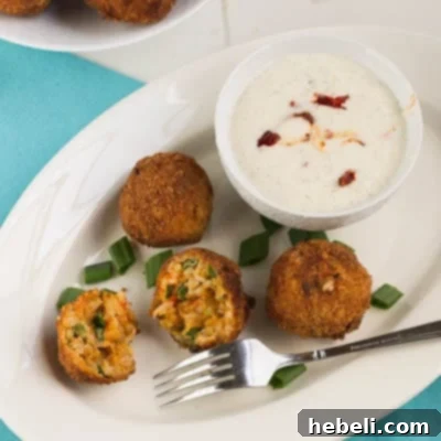 Fried Crawfish Etouffee Balls, perfectly crisp on the outside and spicy on the inside, served with dipping sauce