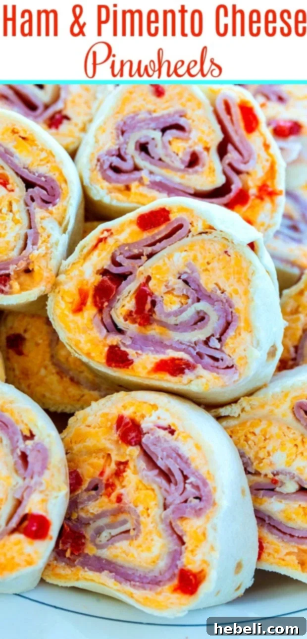 Cheesy Ham & Pimento Swirls 6 A platter of freshly sliced Ham and Pimento Cheese Pinwheels, a perfect make-ahead party food.