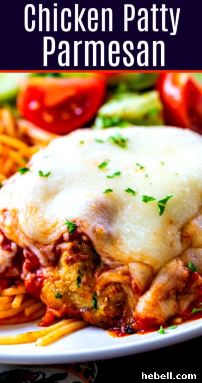 Chicken Patty Parmesan with a thick layer of mozzarella cheese- Made from ground chicken.