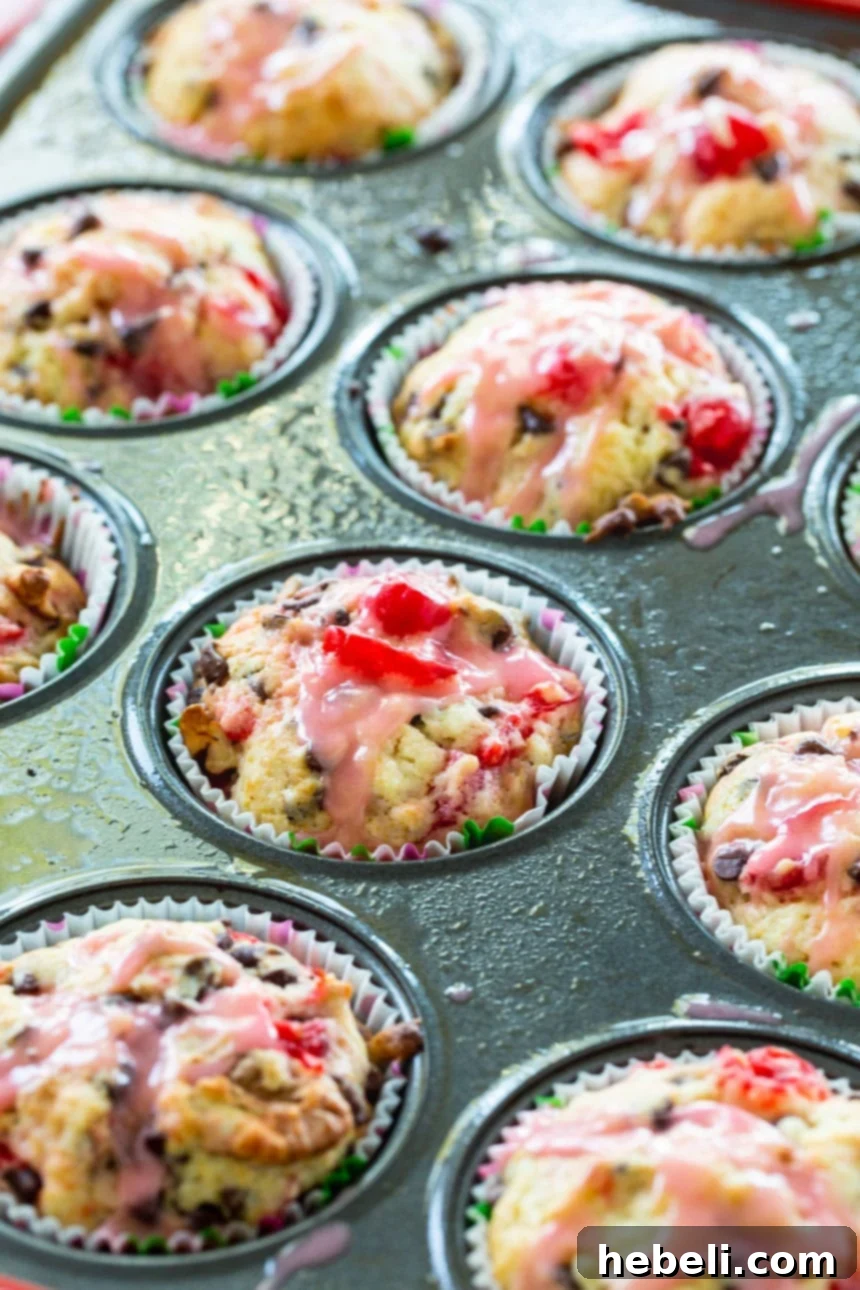 Cherry Chocolate Chip Muffins cooling on a wire rack.