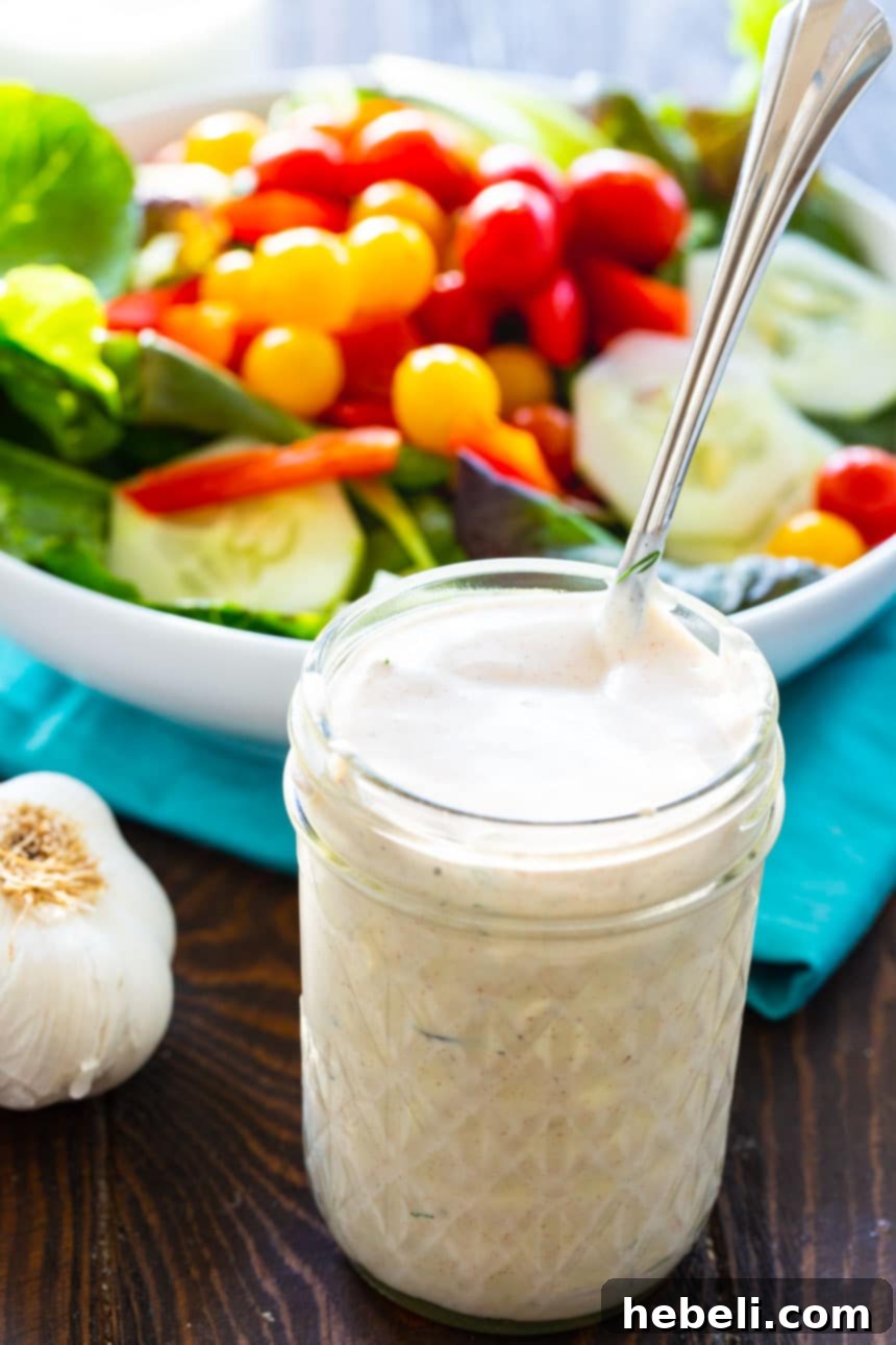 Buttermilk Garlic Dressing in a rustic glass jar, emphasizing its natural, wholesome ingredients.
