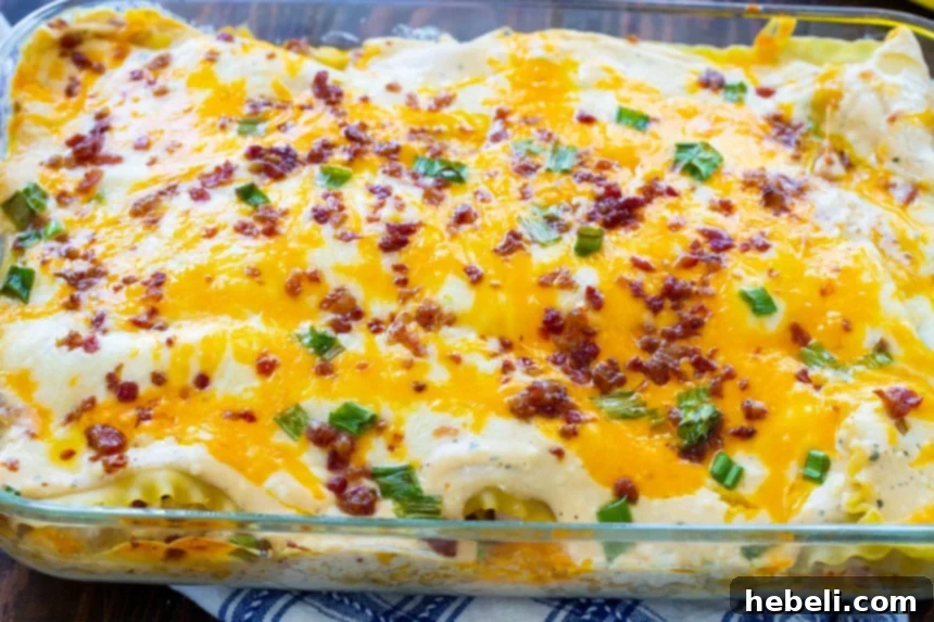 Creamy Chicken Lasagna with Bacon and Ranch, showcasing its golden-brown top.