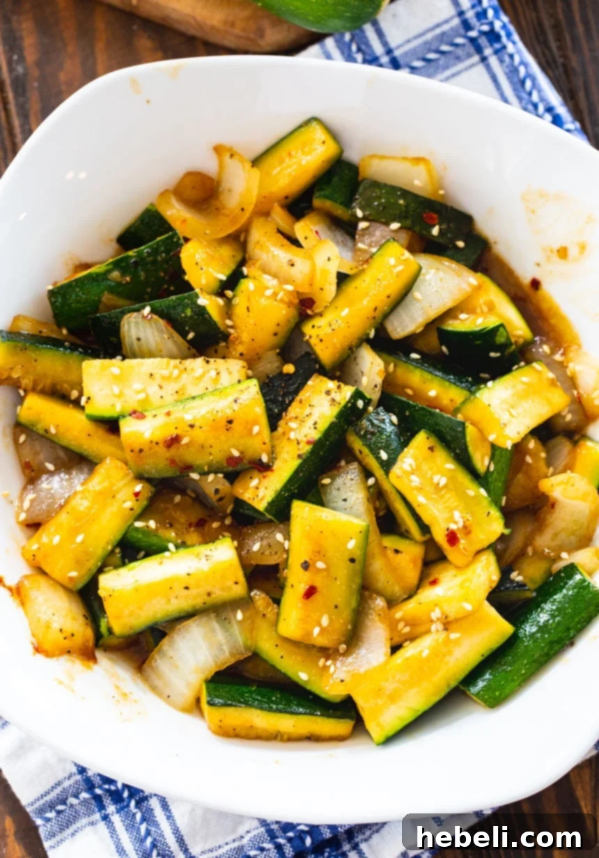 Perfectly Cooked Hibachi Zucchini Japanese Hibachi-Style Zucchini close-up, showing tender pieces.