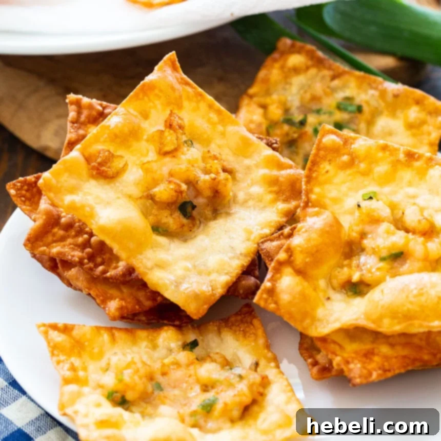 Golden-brown Shrimp Wonton Chips artfully arranged on a serving plate, highlighting their crispy texture and delicious shrimp filling, ready to be enjoyed as a gourmet appetizer.