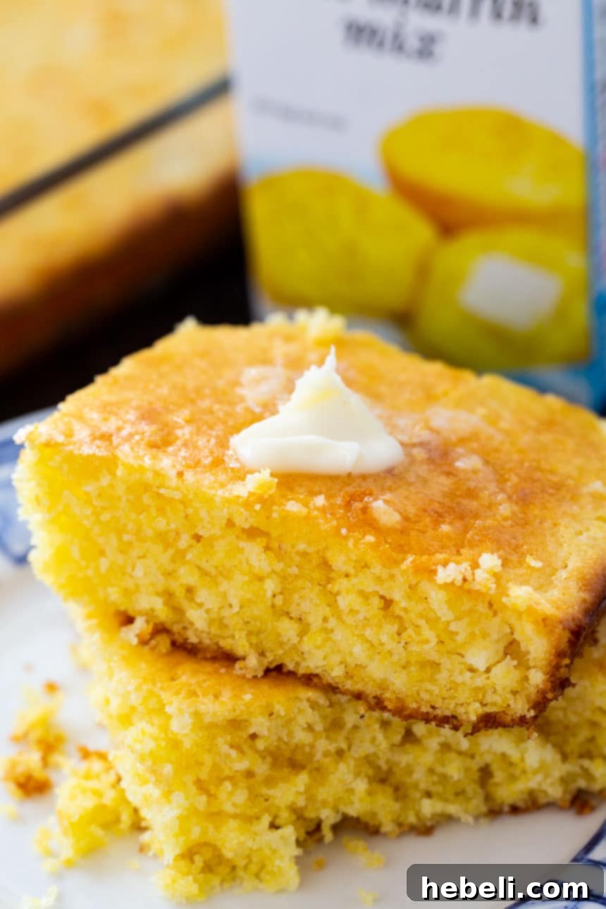 Your New Favorite Jiffy Cornbread 4 Close-up of a slice of The Best Jiffy Cornbread, highlighting its moist, tender crumb and golden crust.