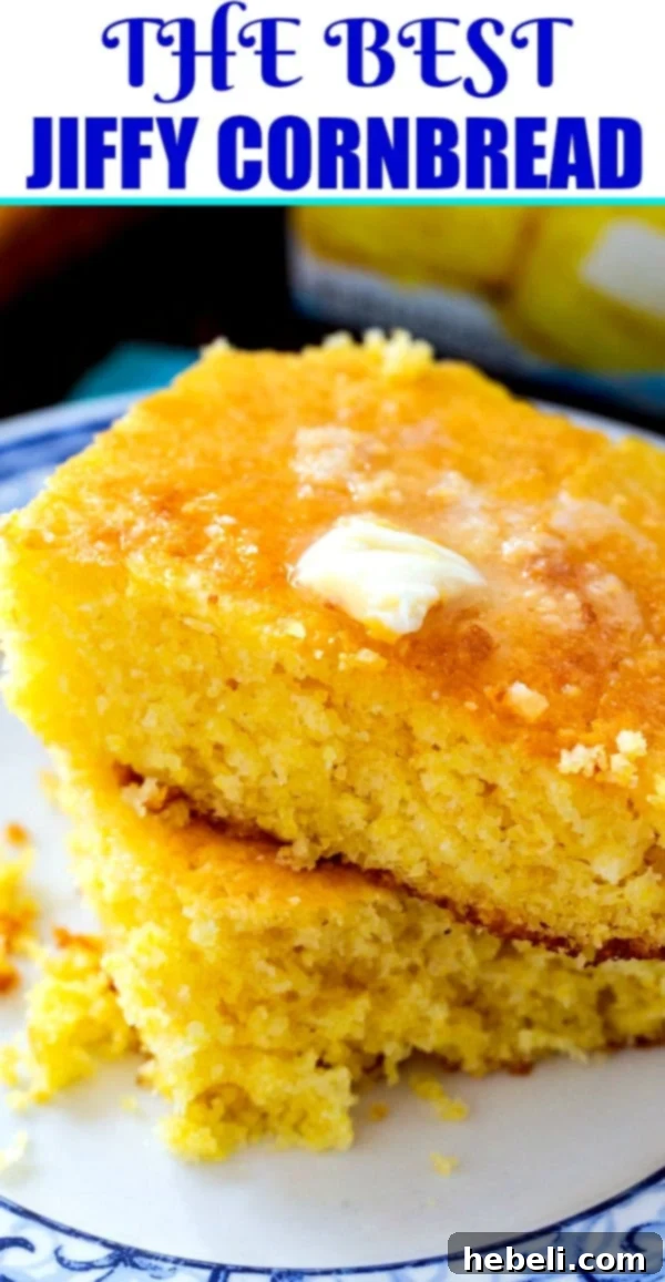 Your New Favorite Jiffy Cornbread 6 A large slice of The BEST Jiffy Cornbread, emphasizing its tender texture and perfectly golden-brown crust.