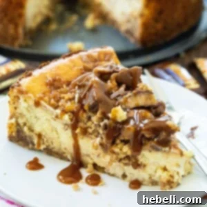 slice of Toffee Cheesecake with caramel sauce drizzled on top