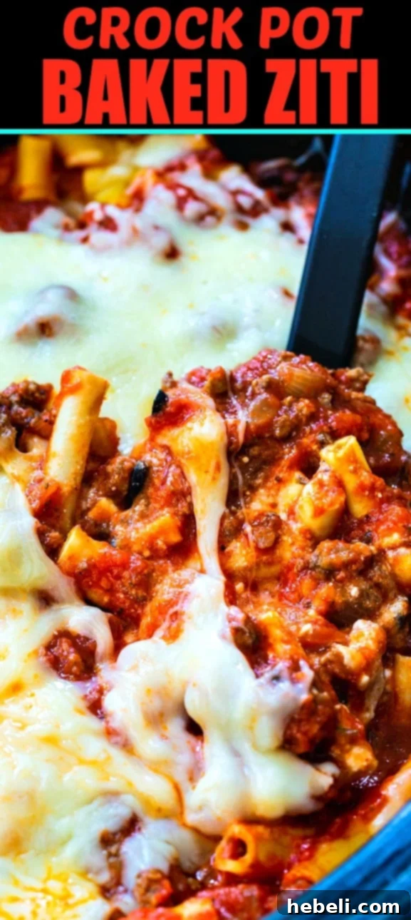 Close-up of Slow Cooker Baked Ziti, showcasing the rich texture of ground beef, pasta, and melted cheese layers.