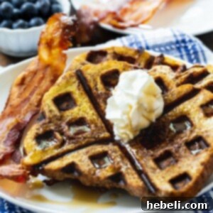 Waffled French Toast on a plate with bacon