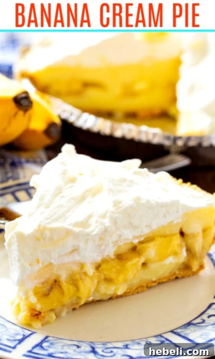A vibrant close-up of the delicious homemade Banana Cream Pie, highlighting its smooth, creamy layers and a hint of graham cracker crust.