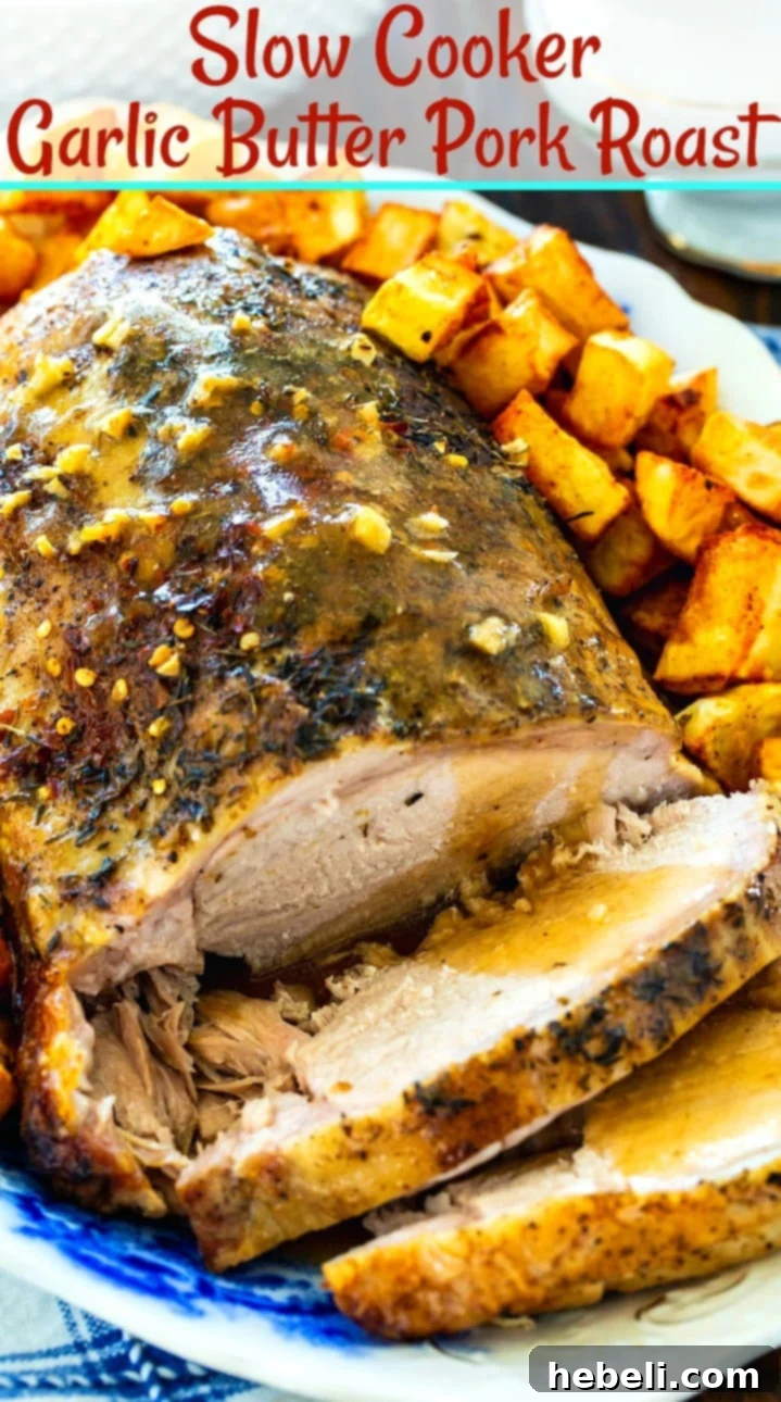 Close-up of the Slow Cooker Garlic Butter Pork Roast, showcasing its tender texture and rich gravy, ready to be enjoyed.