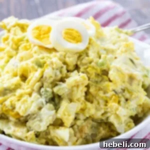 Mustard-Style Potato Salad in a white bowl.