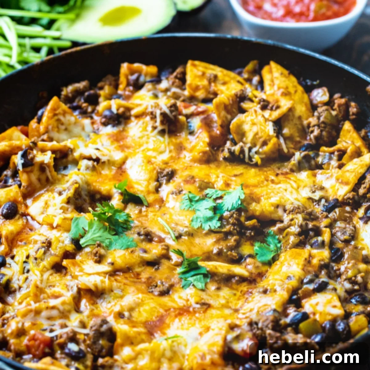 One-Pot Beef Burrito Skillet 2 Easy Beef Burrito Skillet in a nonstick skillet, garnished and ready to serve.