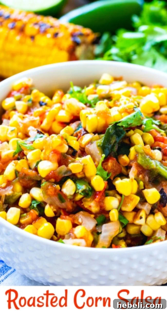 A close-up view of Roasted Corn Salsa, highlighting the chunky texture and vibrant colors of the ingredients in a white bowl.
