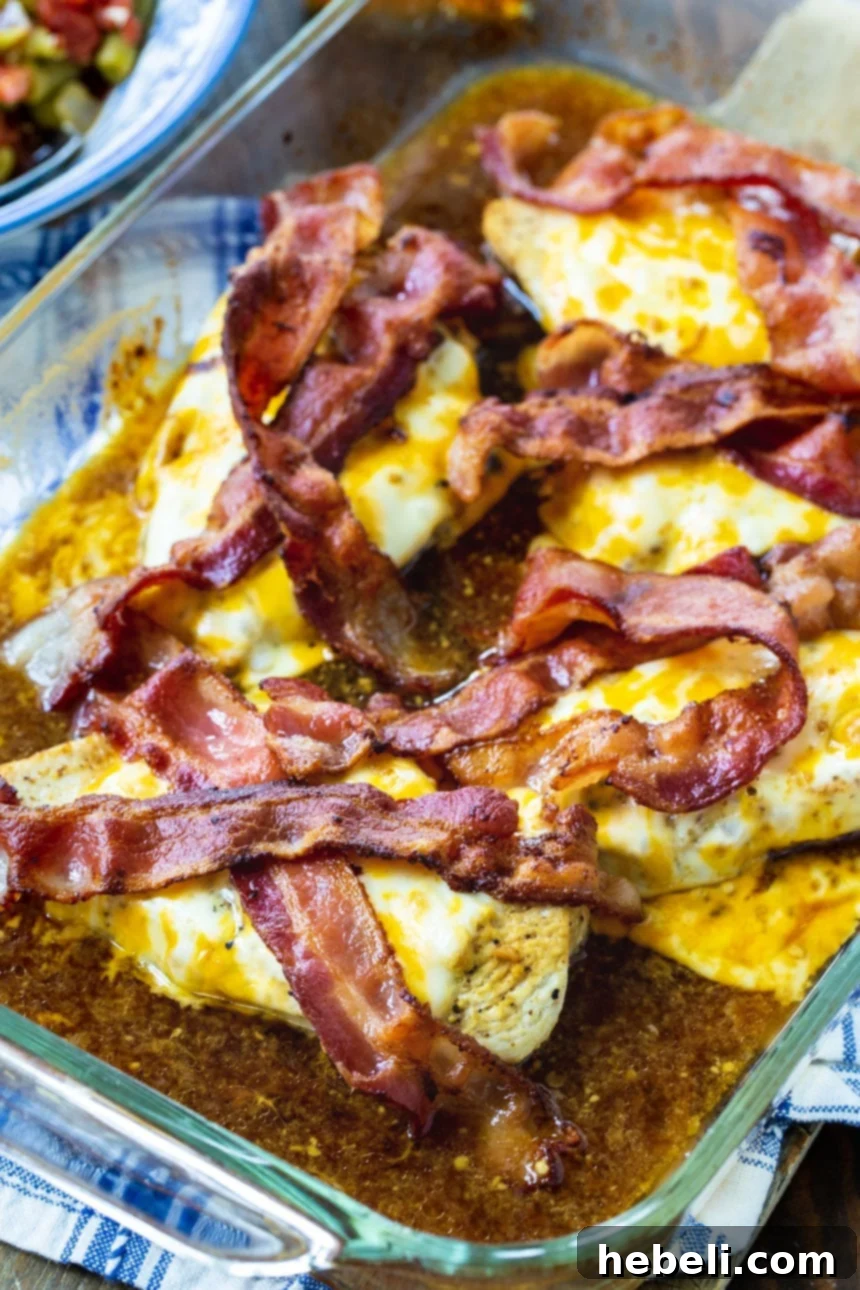 Maple Bacon Chicken Melt 4 Baked Maple Bacon Chicken in a baking dish, golden brown with melted cheese and crispy bacon.