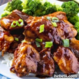 Chicken Teriyaki on a plate with broccoli.