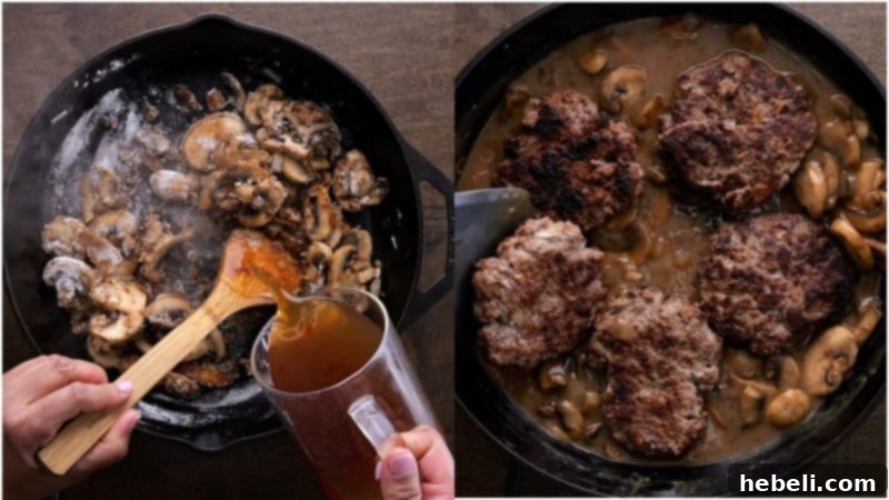 Several hamburger steaks simmering in a thick, rich mushroom gravy within a large skillet, completing the cooking process.