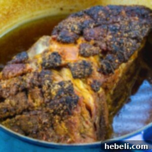 A vibrant image of the prepared Cuban Roast Pork, showcasing its rich color and tender texture, ready to be served.