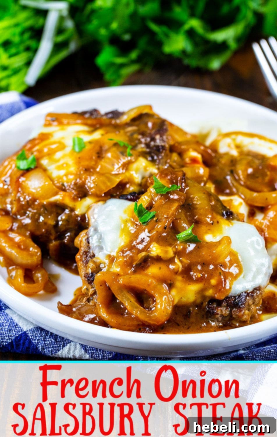 French Onion Smothered Salisbury Steak 6 French Onion Salisbury Steak on a plate, featuring the golden-brown patties, rich gravy, and melted cheese, ready to be served.
