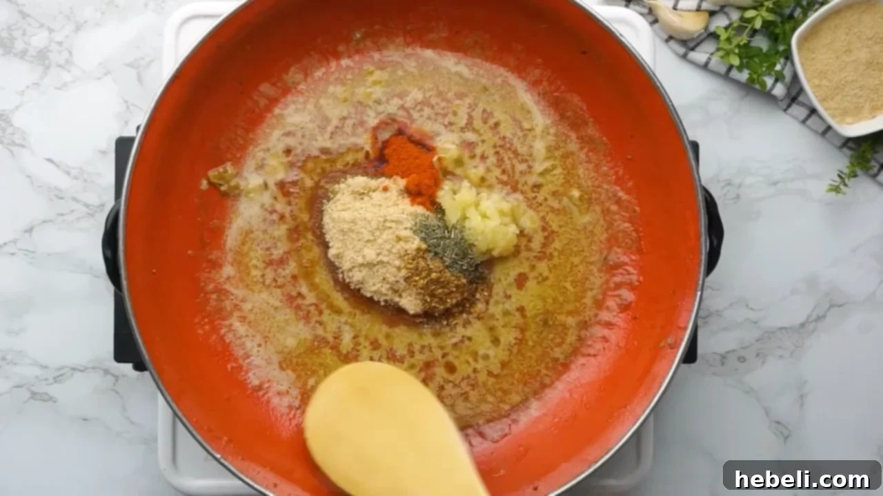 Sticky Brown Sugar Garlic Pork Chops 7 Making the sweet and savory pork chop glaze in the skillet.