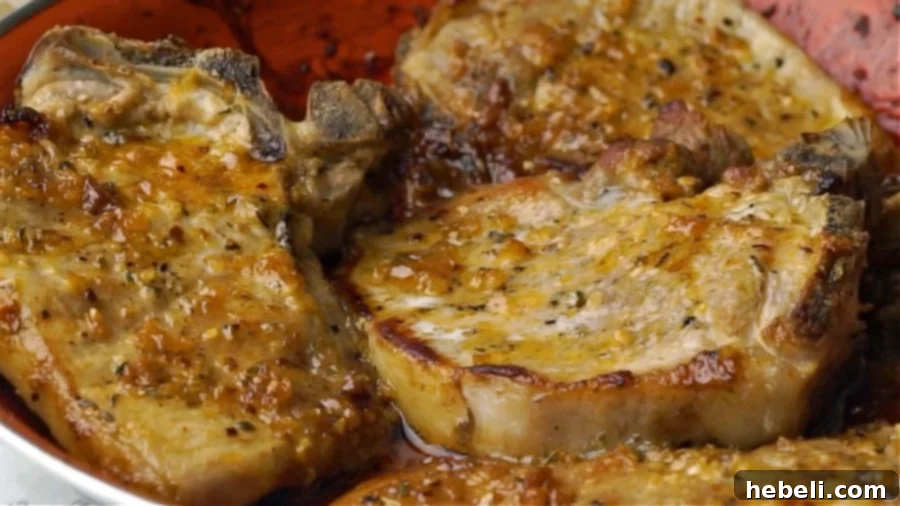 Sticky Brown Sugar Garlic Pork Chops 9 Finished Brown Sugar Garlic Pork Chops baking in the pan, ready to be served.