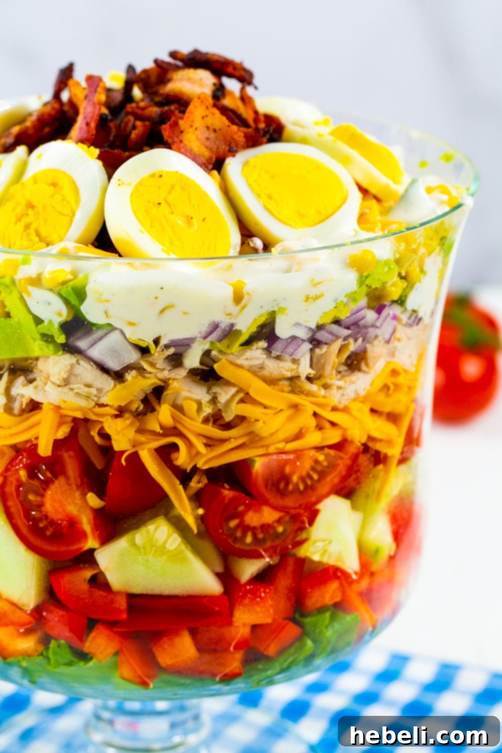 Layered Chicken Bacon Ranch Salad 4 Chicken Bacon Ranch Layer Salad in a glass trifle bowl.