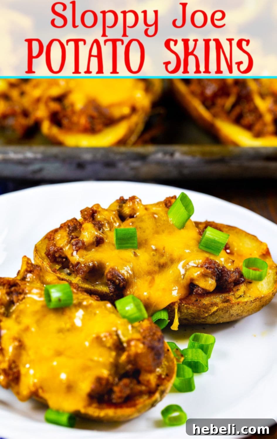 A tantalizing close-up of a perfectly baked Sloppy Joe Potato Skin, topped with melted cheese and fresh green onions, ready to be savored.