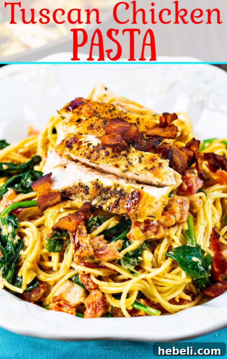 Creamy Tuscan Chicken Pasta 6 A final close-up of the delectable Tuscan Chicken Pasta in a large skillet, garnished and ready to be enjoyed.