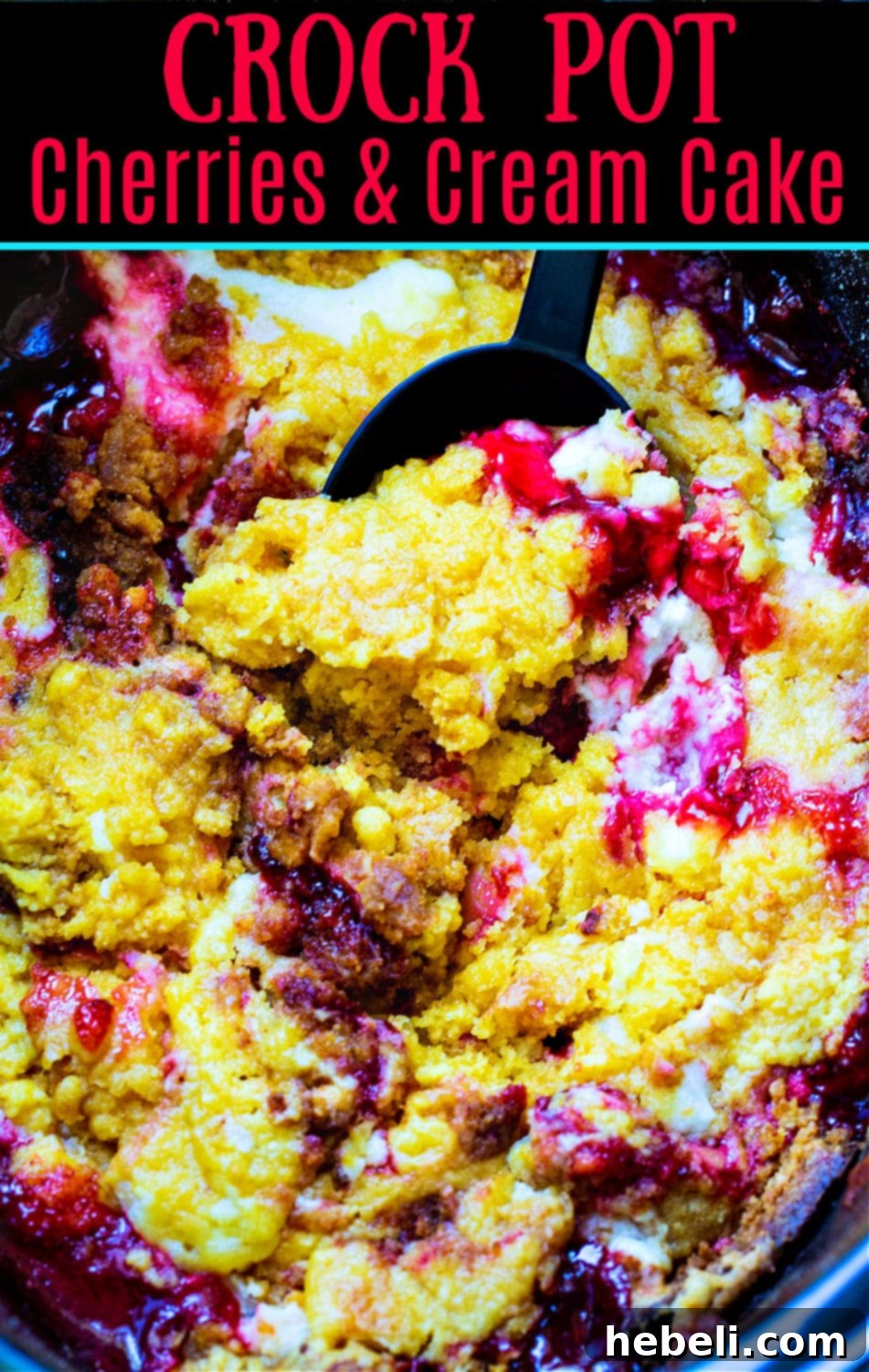 A bowl of Crock Pot Cherries and Cream Dump Cake with a spoonful ready to eat.