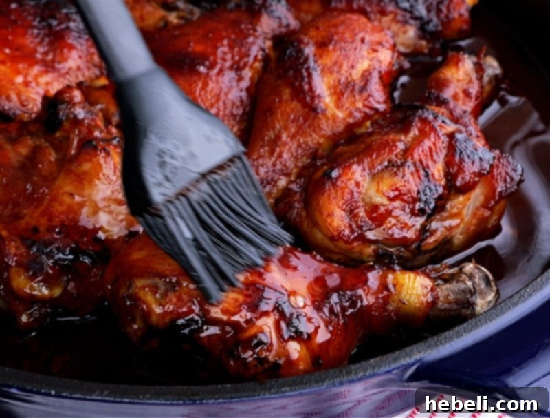 Caramelized Southern Chicken 6 Brushing the chicken generously with the sticky glaze during the baking process.