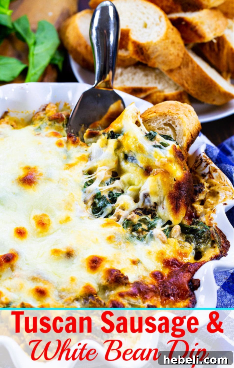 A beautifully arranged Tuscan Sausage and White Bean Dip in a stylish white dish, showcasing its inviting texture and appetizing appeal.