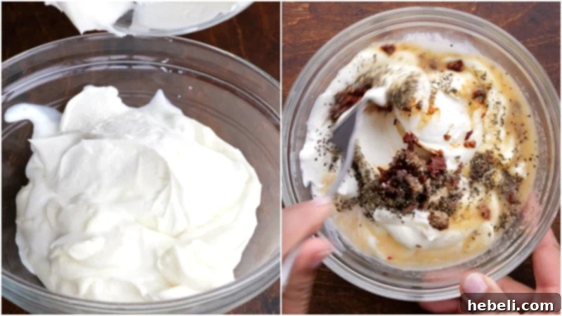 Creamy Chipotle Chicken Pasta Salad 4 Hand stirring creamy mayonnaise and chipotle dressing in a clear bowl.