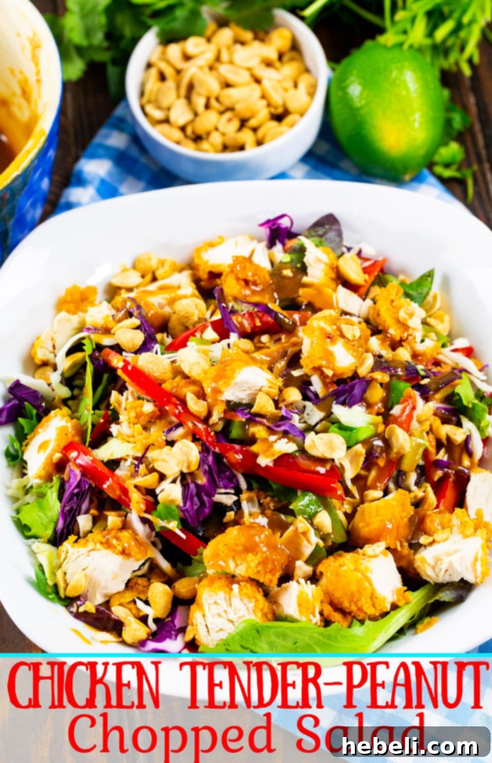 A close-up of Chicken Tender-Peanut Chopped Salad in a bowl, showcasing the vibrant colors and textures.