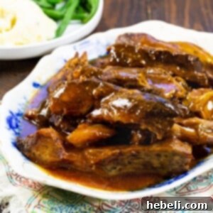 Slow Cooker Sweet and Sour Country Ribs on a platter, ready to be served.