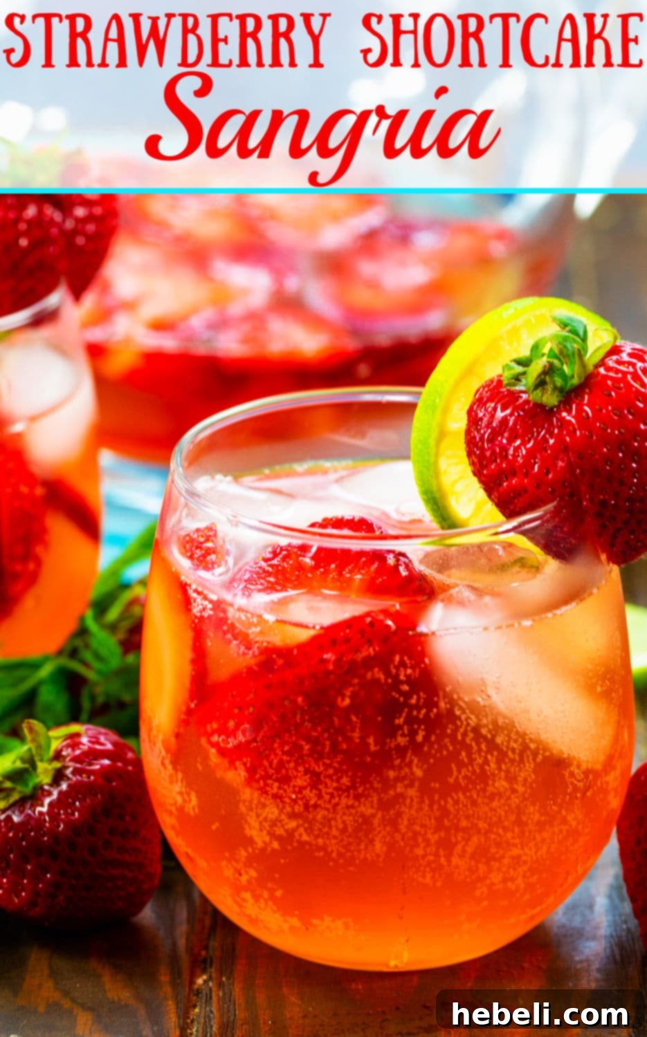 A refreshing pitcher of Strawberry Shortcake Sangria, ready to be poured and enjoyed.