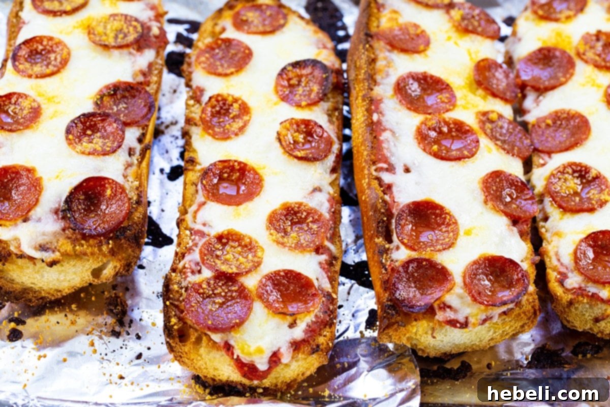 Four slices of Pepperoni French Bread Pizza, perfectly golden and melted.