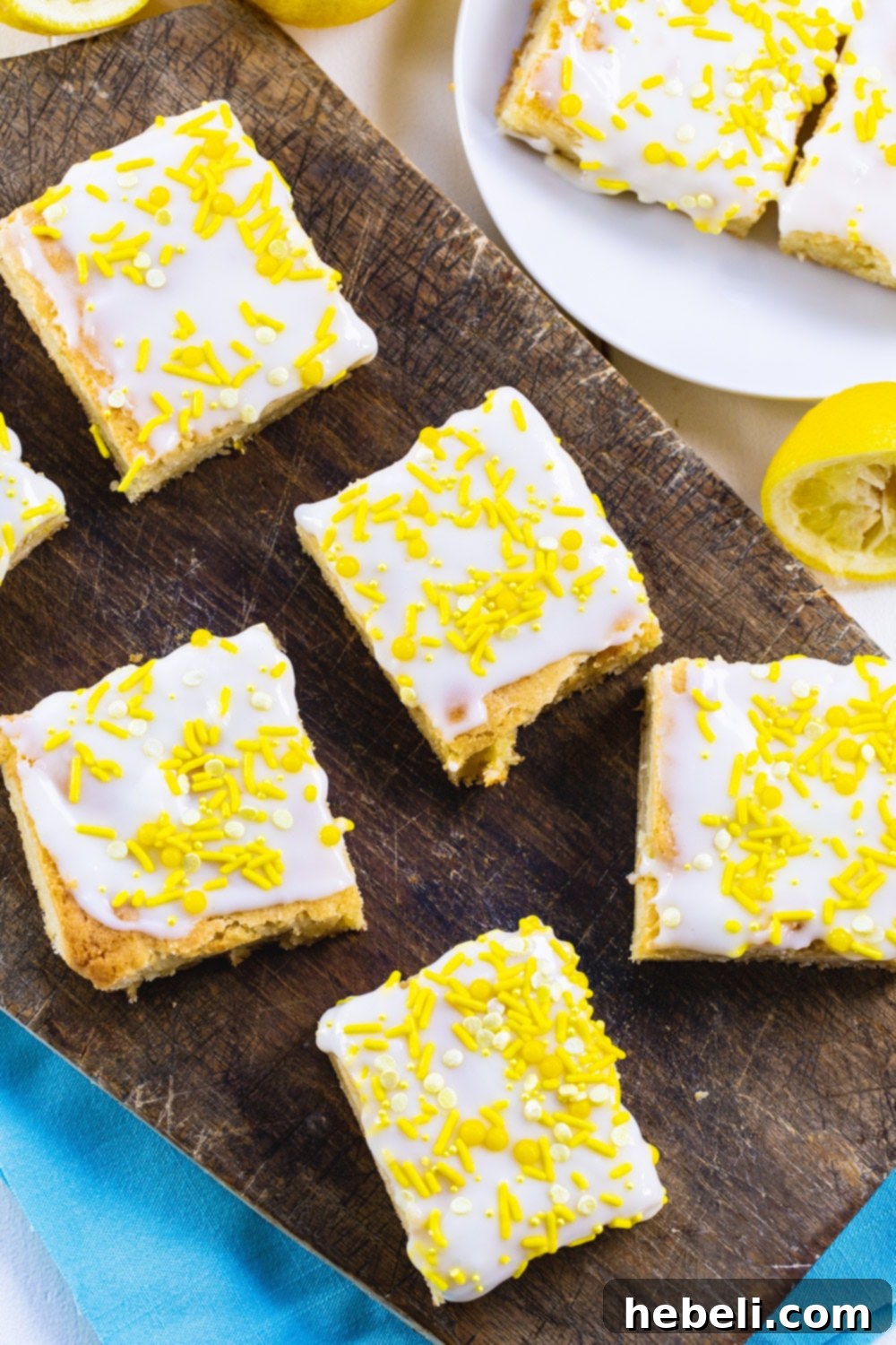 Overhead of Lemon Cookie Bars on a wood board.